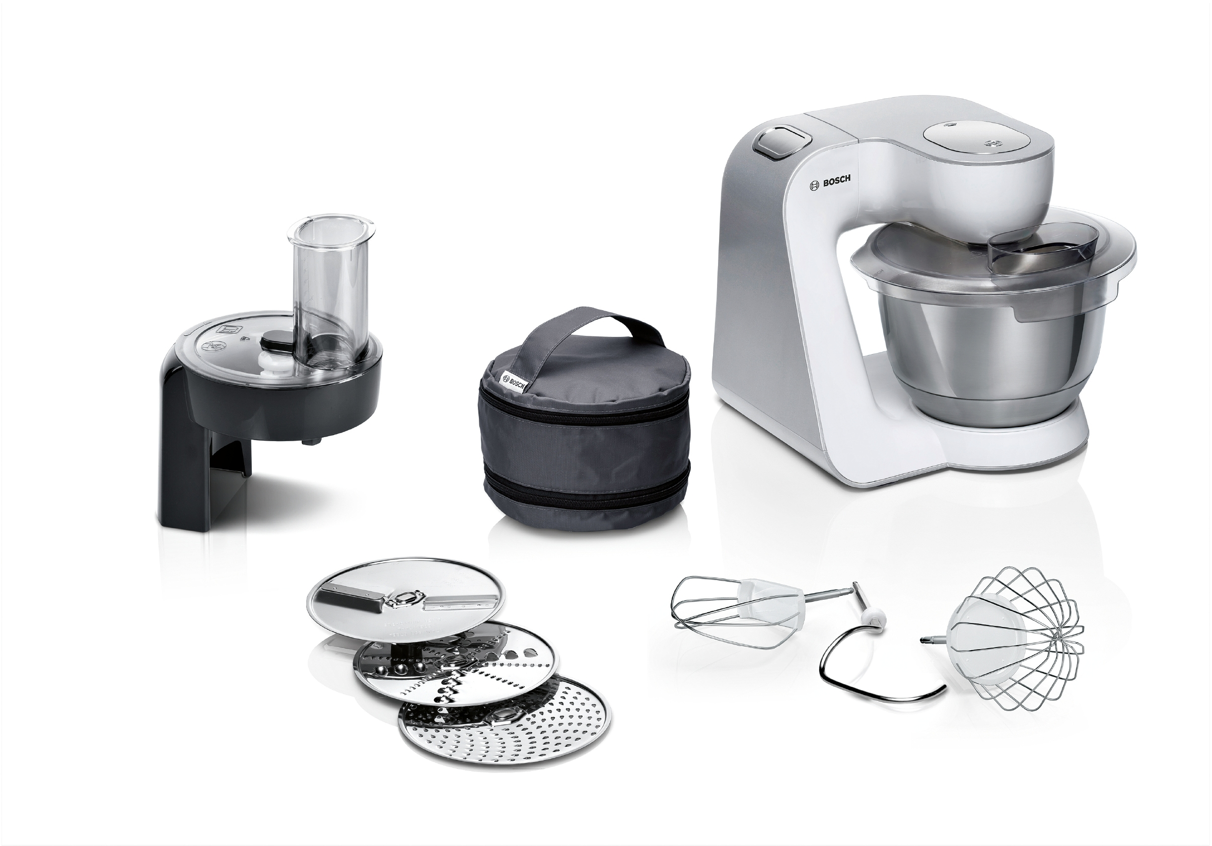 Küchenmaschine mit Zubehör: Einfülltrichter, Beutel, Schneebesen, Knethaken, Scheiben.