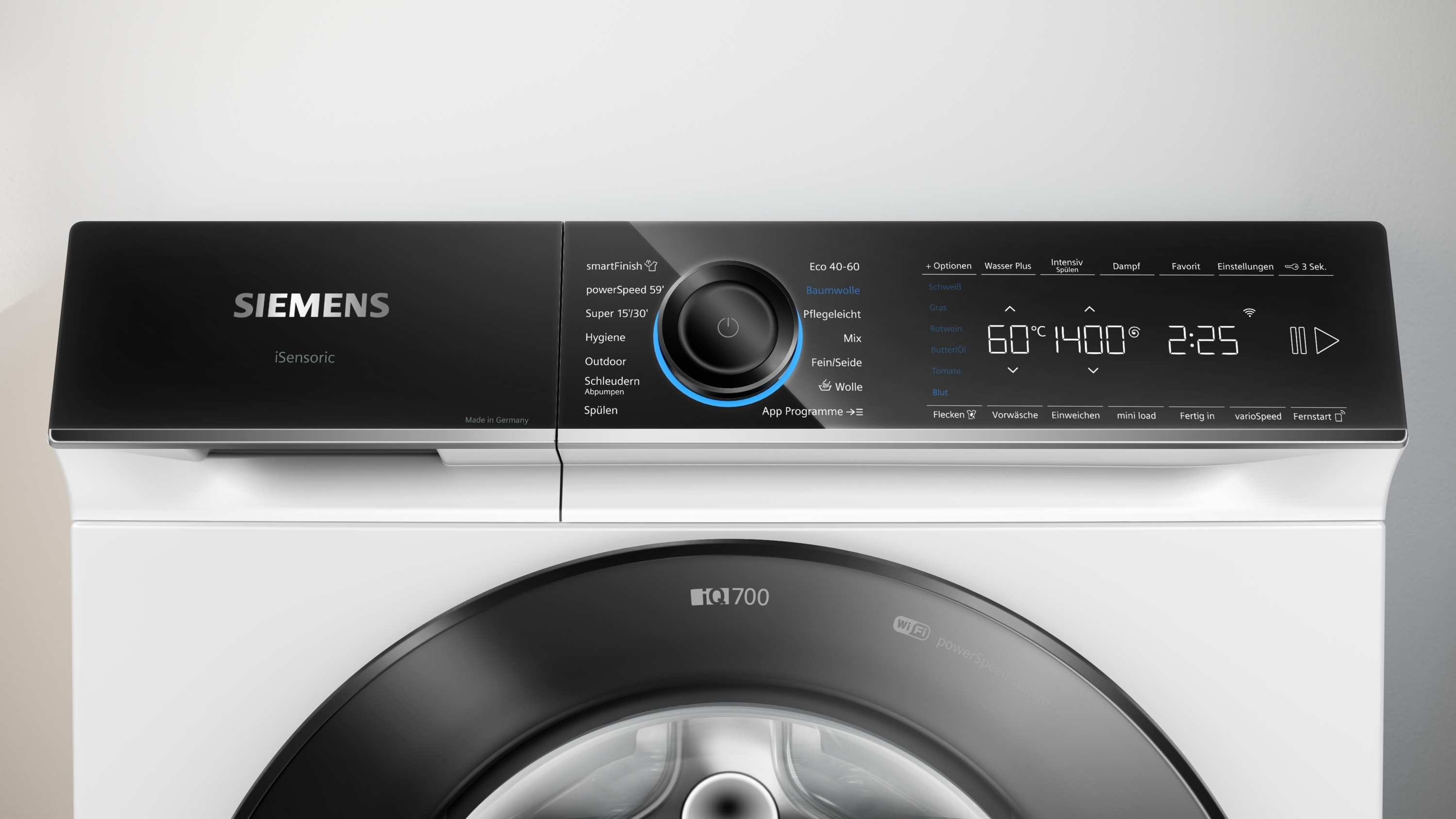 Nahaufnahme des Siemens iQ700 Waschmaschinen-Bedienfelds mit digitalem Display und Programmwählknopf.