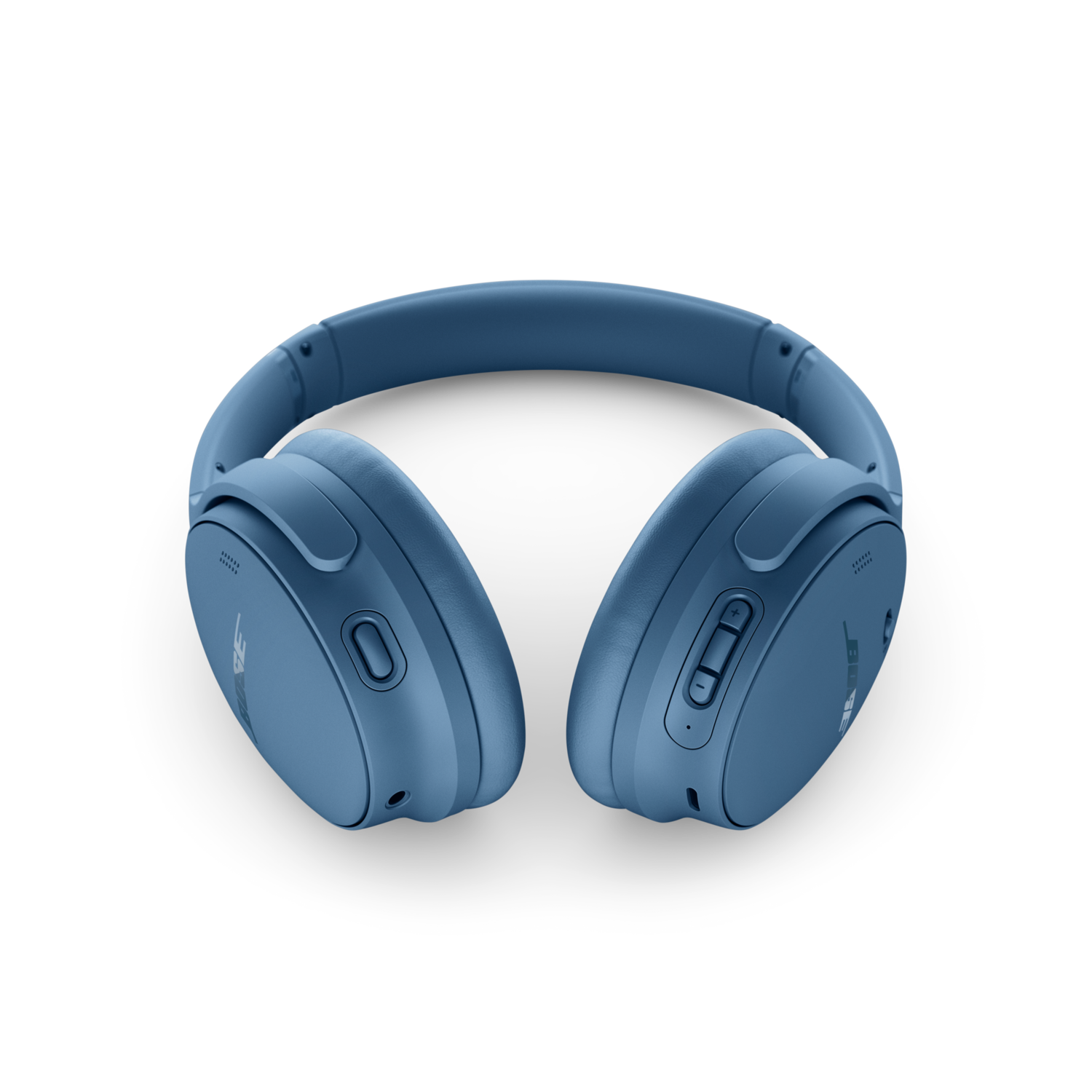 Blue Bose headphones, showing the earcups and controls on a dark background.