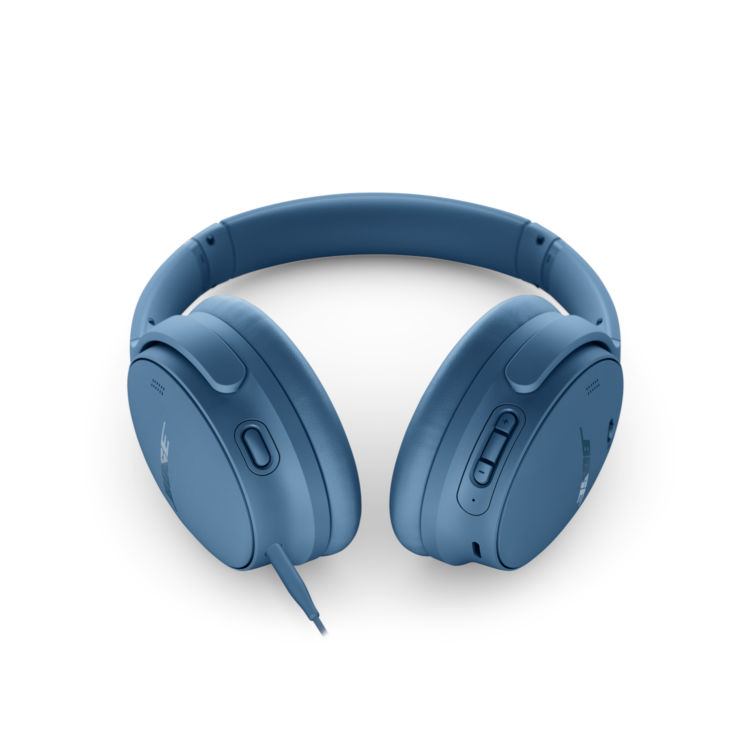 Blue over-ear headphones with a connected wire. The headphones are on a black background.