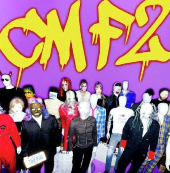 Groupe de personnes avec des masques et des visages. Le texte "CMFZ" en jaune est sur fond violet.