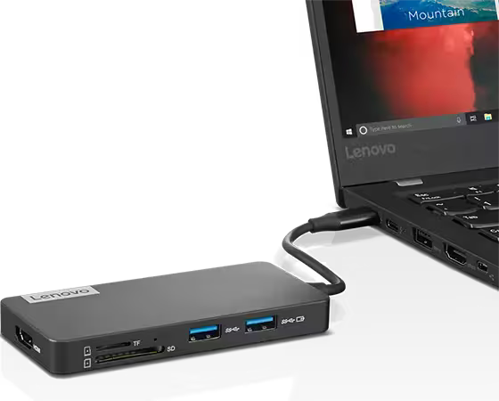 USB ve diğer cihazlar için bağlantı noktaları olan bir Lenovo yerleştirme istasyonuna bağlı bir dizüstü bilgisayar.