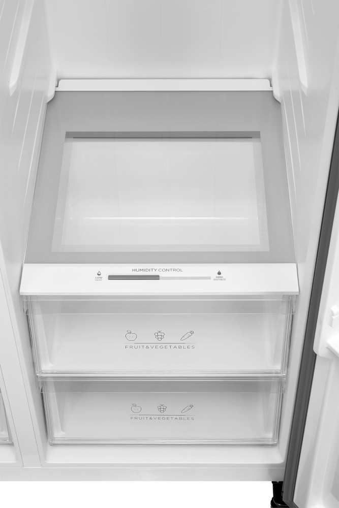 Interior of a refrigerator, showing two drawers labeled 'Fruit & Vegetables'.