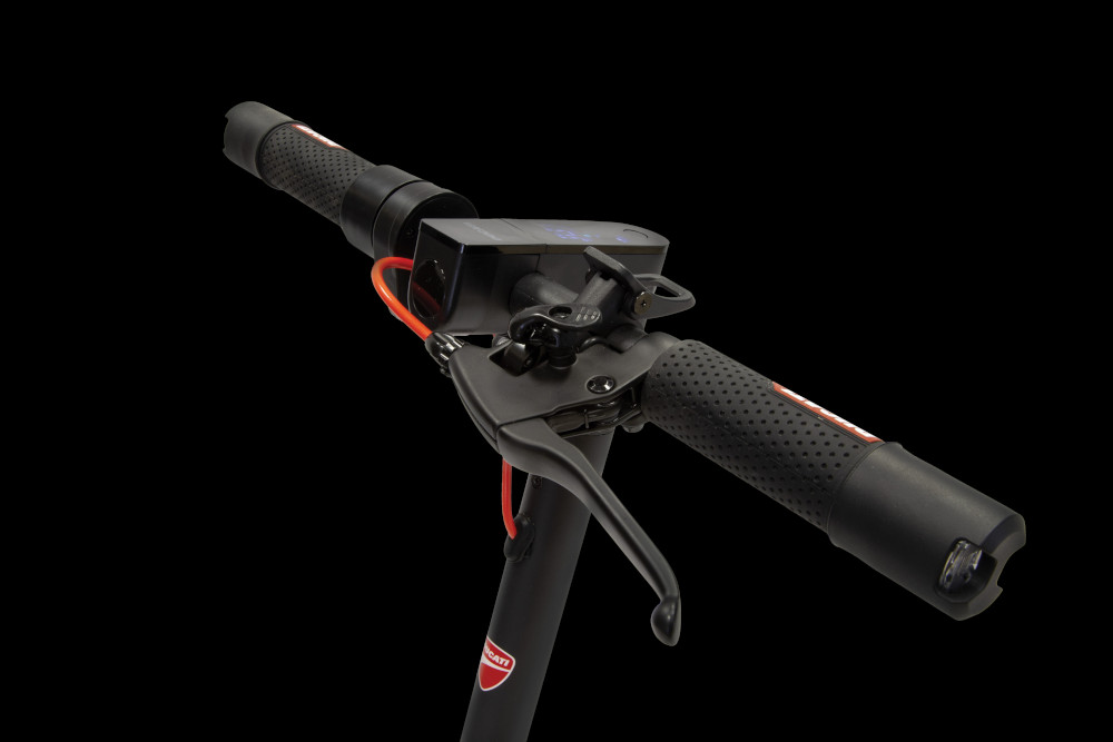Black and red scooter handlebar with brake lever.