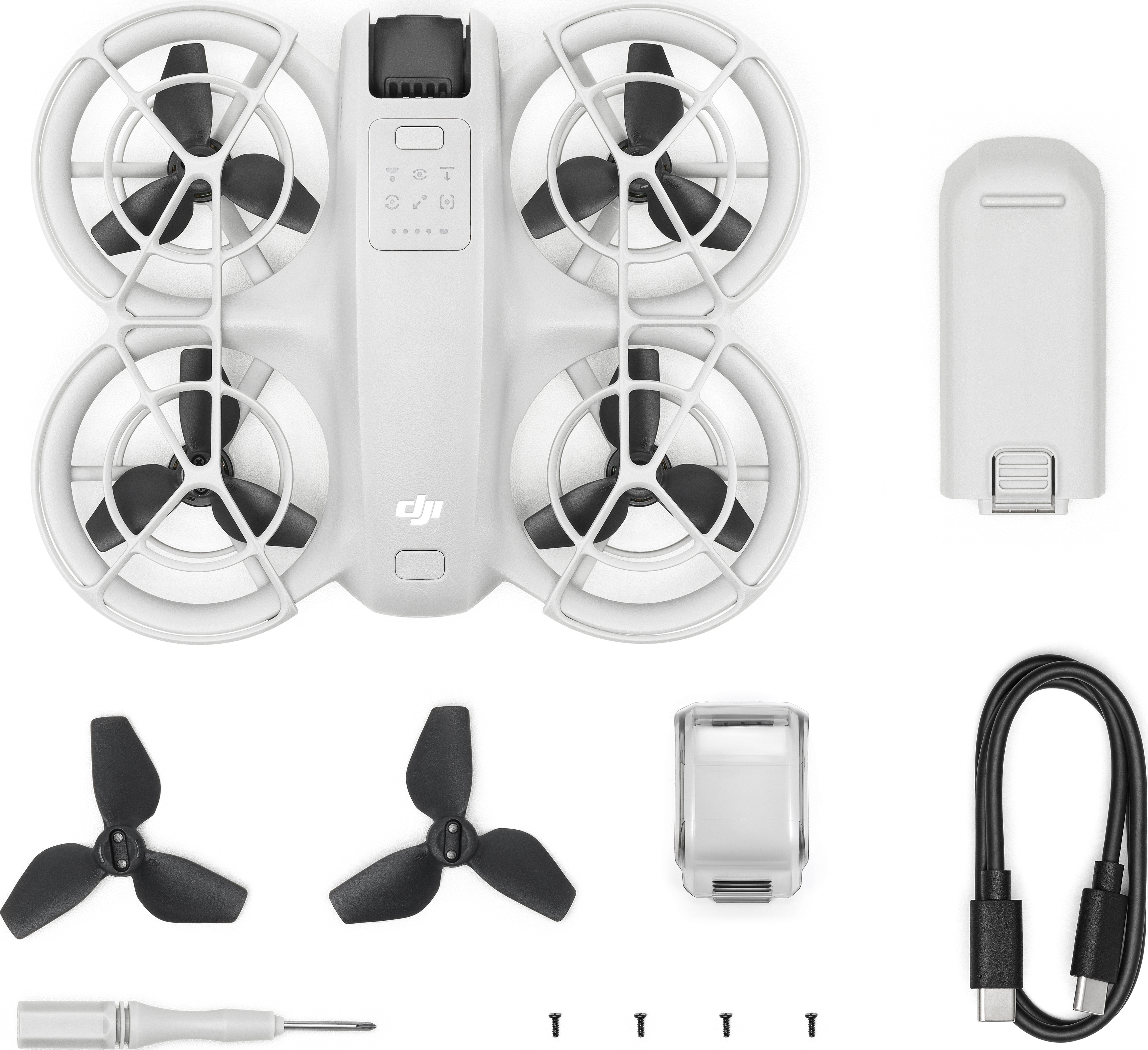 Drone blanc avec hélices et accessoires. Vue de dessus.