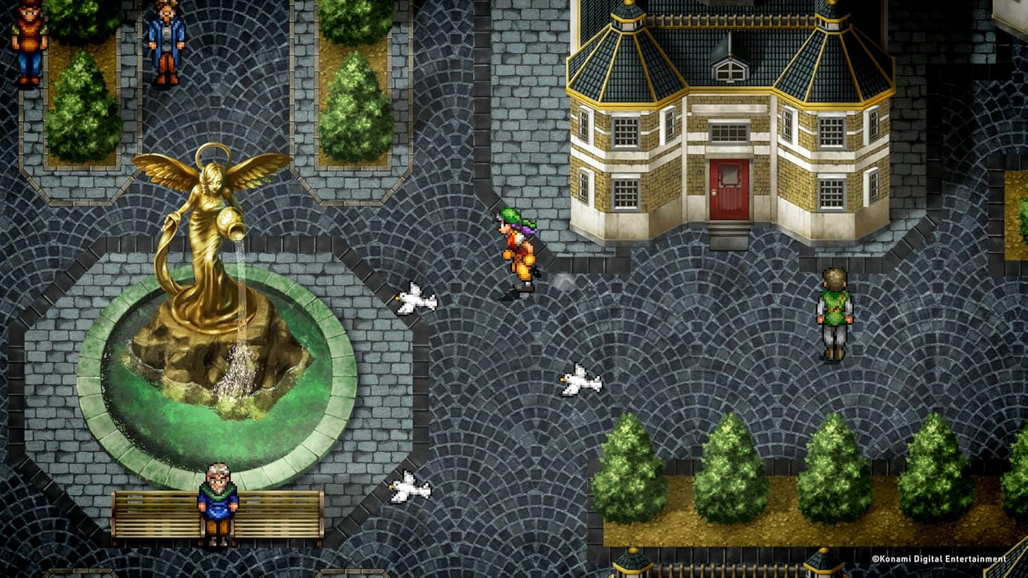 Vista aérea de una plaza pixelada con figuras, árboles, fuente y edificio.