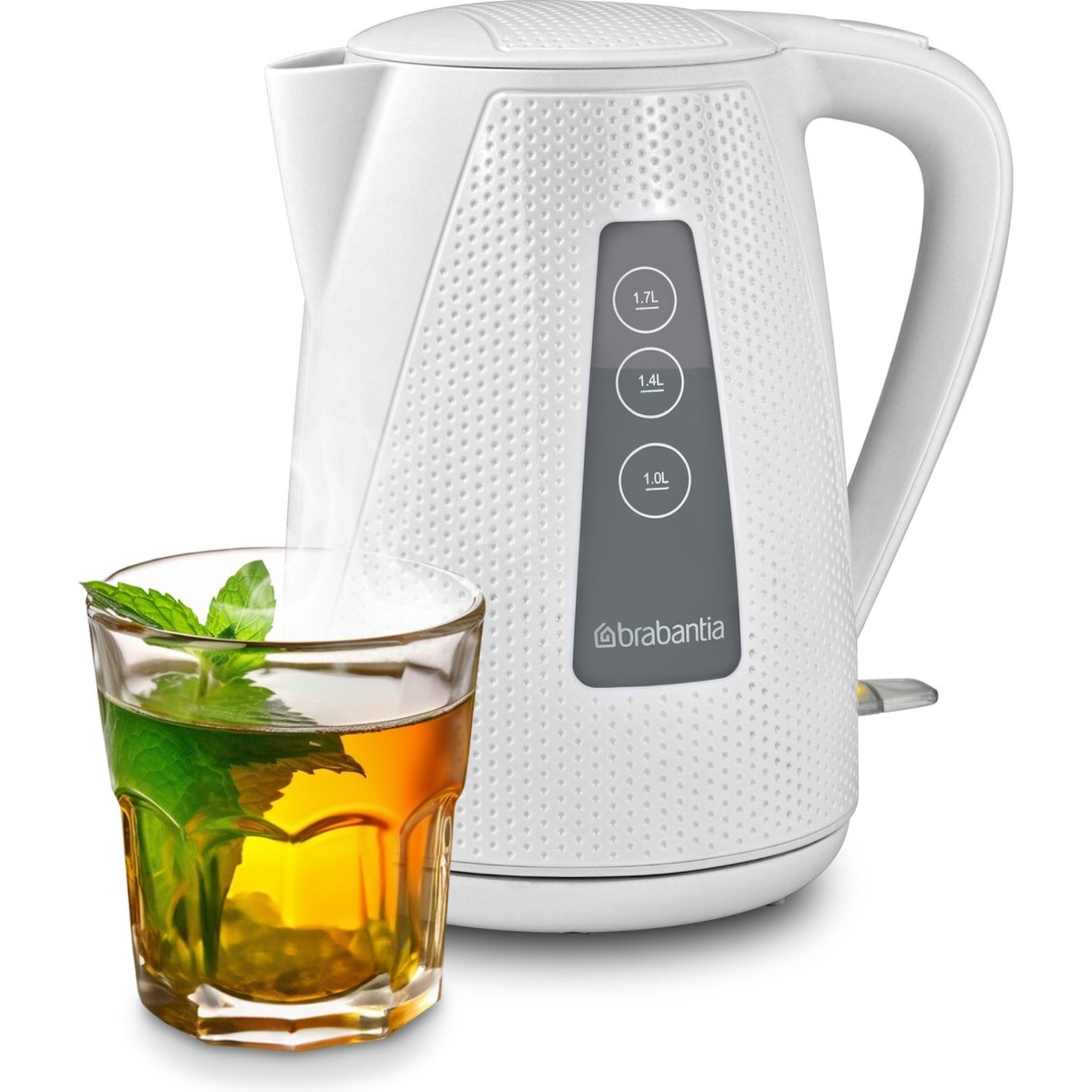 White Brabantia kettle with a glass of tea and mint.