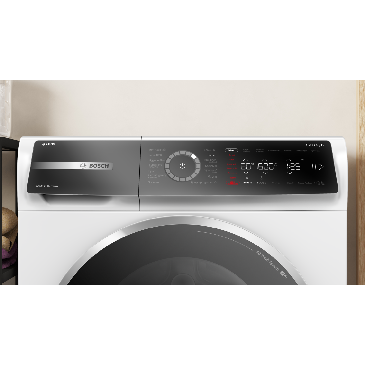 A washing machine control panel with several buttons and a display.