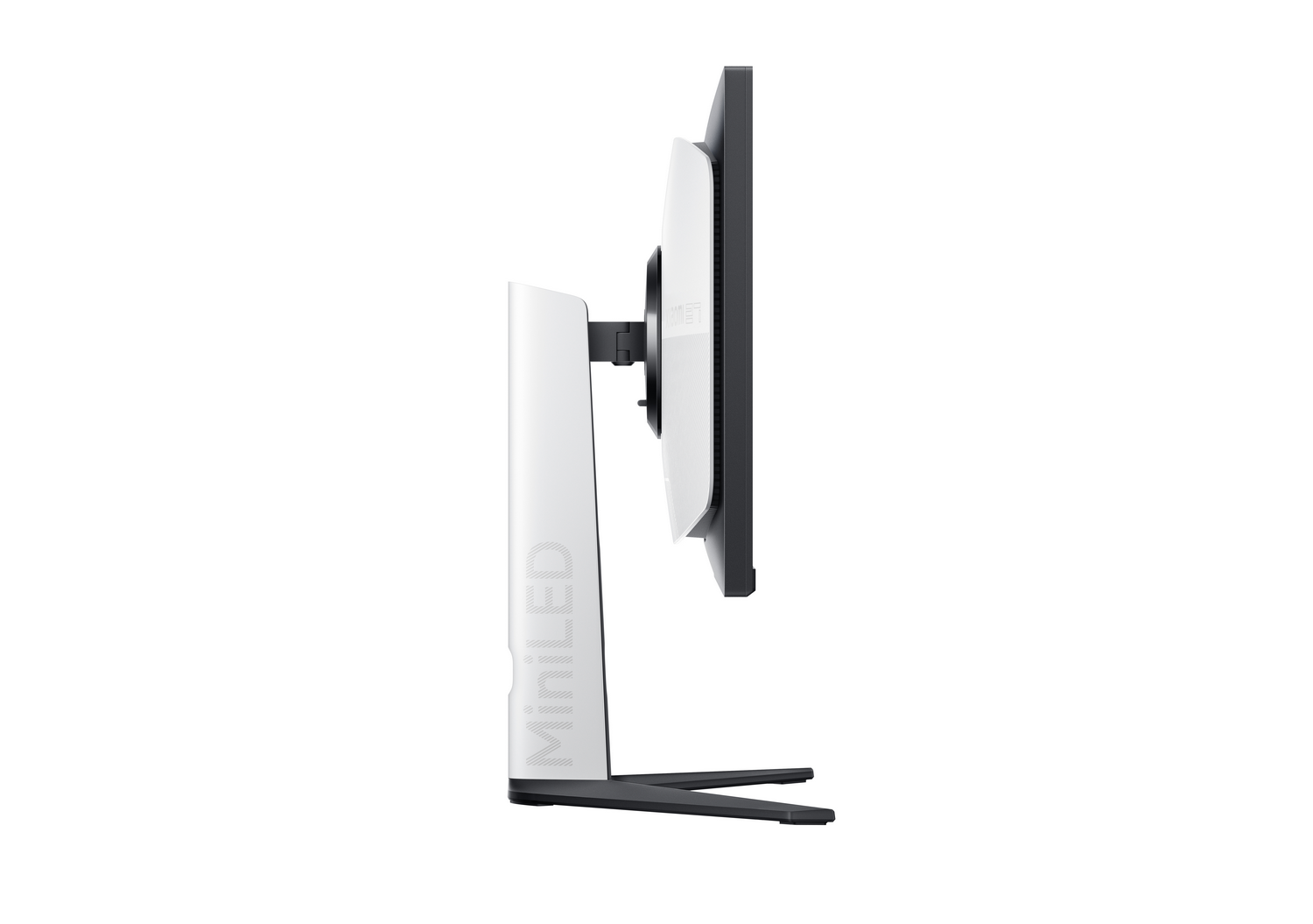 Un monitor blanco con pantalla negra, girado hacia un lado, sobre un soporte blanco y negro.