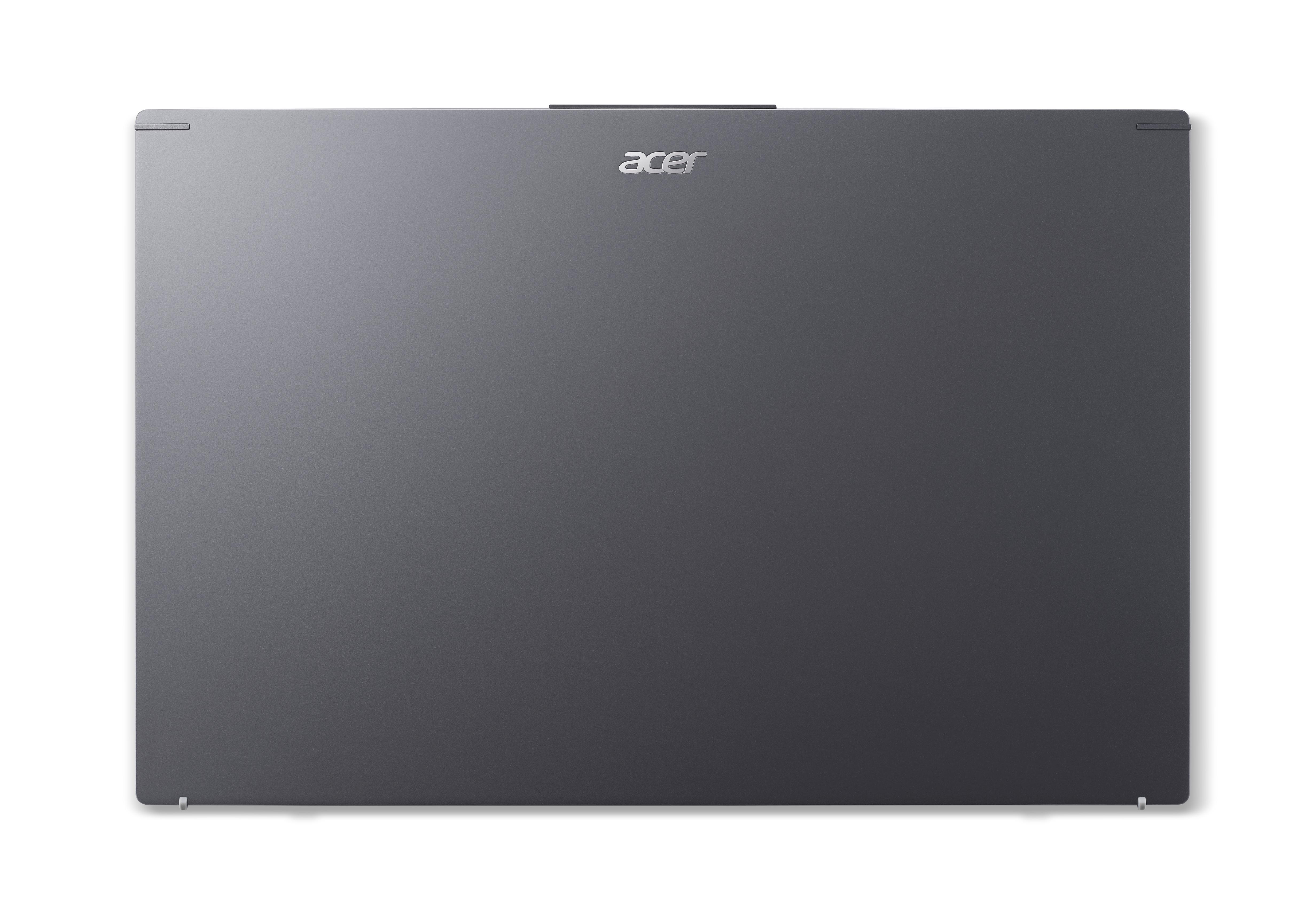 Draufsicht auf Laptop. Dunkelgraue Abdeckung mit silbernem Acer-Logo.