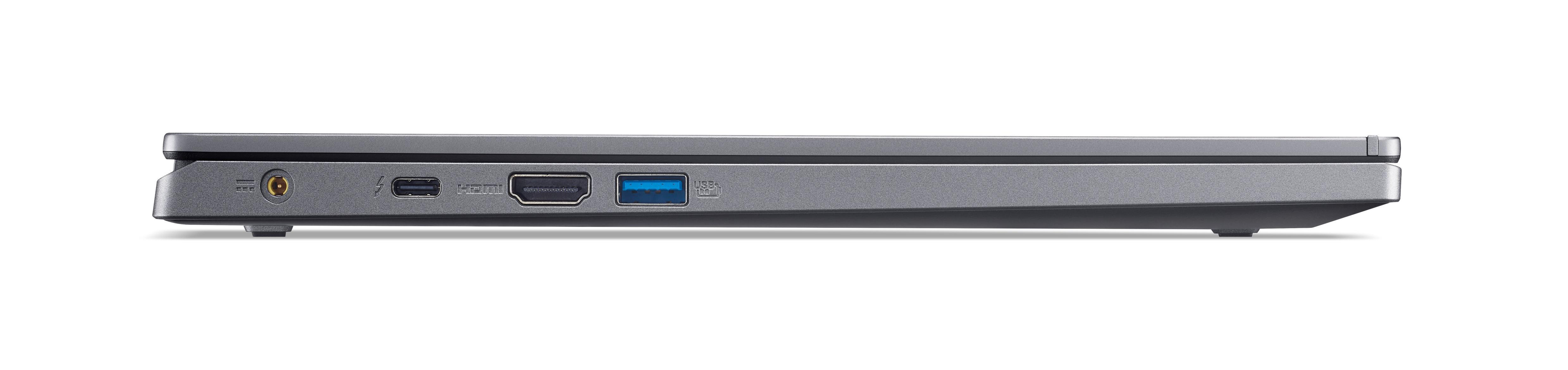 Seitenansicht des Laptops. Zeigt Anschlüsse: Audio, USB, HDMI und Strom.