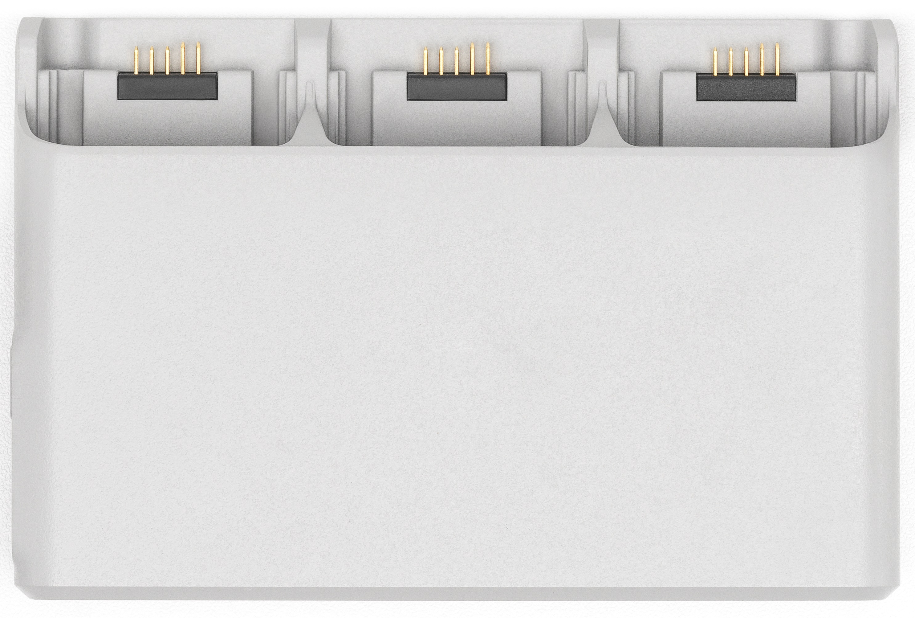 Biała podstawa ładująca z trzema gniazdami ładowania. Widoczne złote piny kontaktowe.