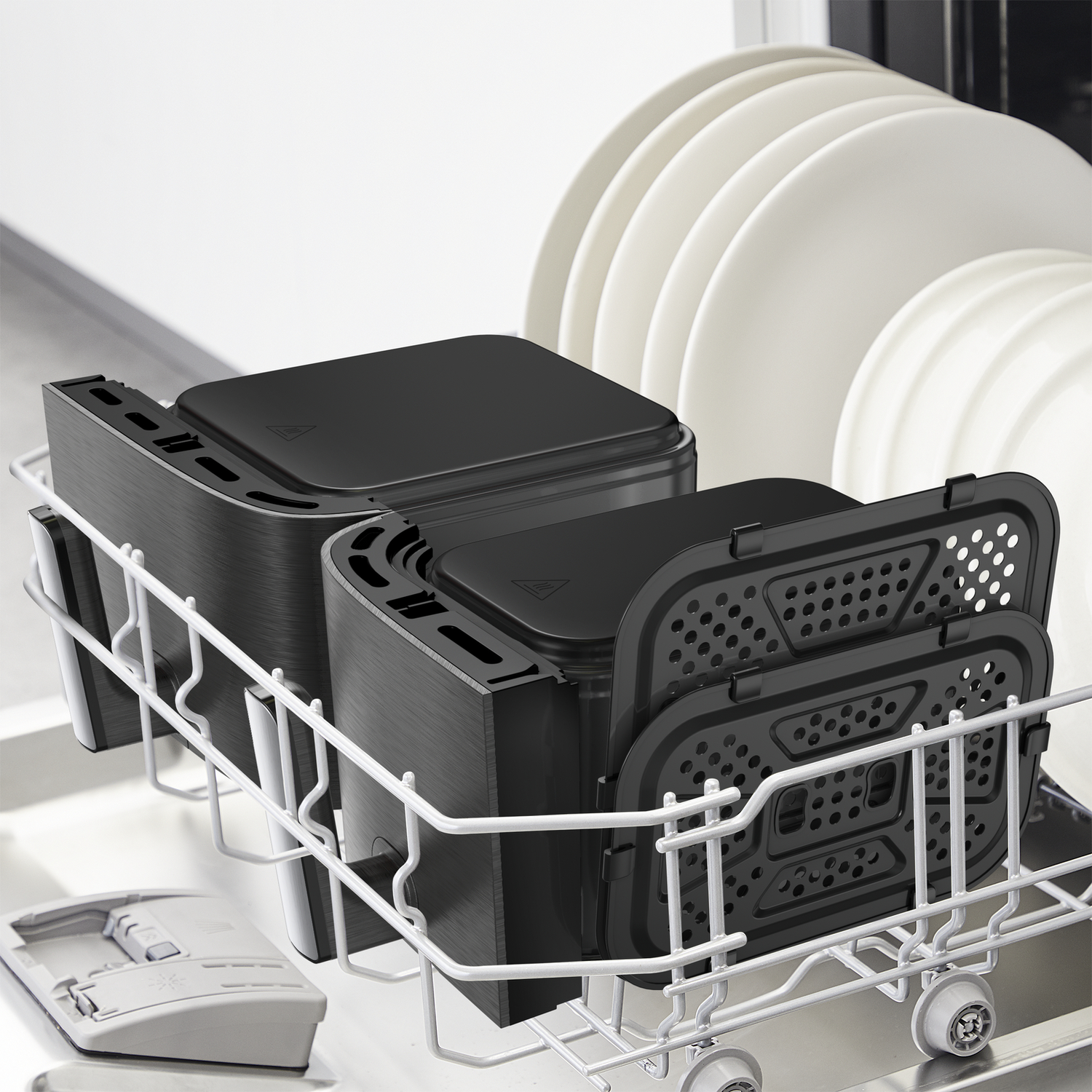 Dishwasher. Contains black air fryer parts and white plates.
