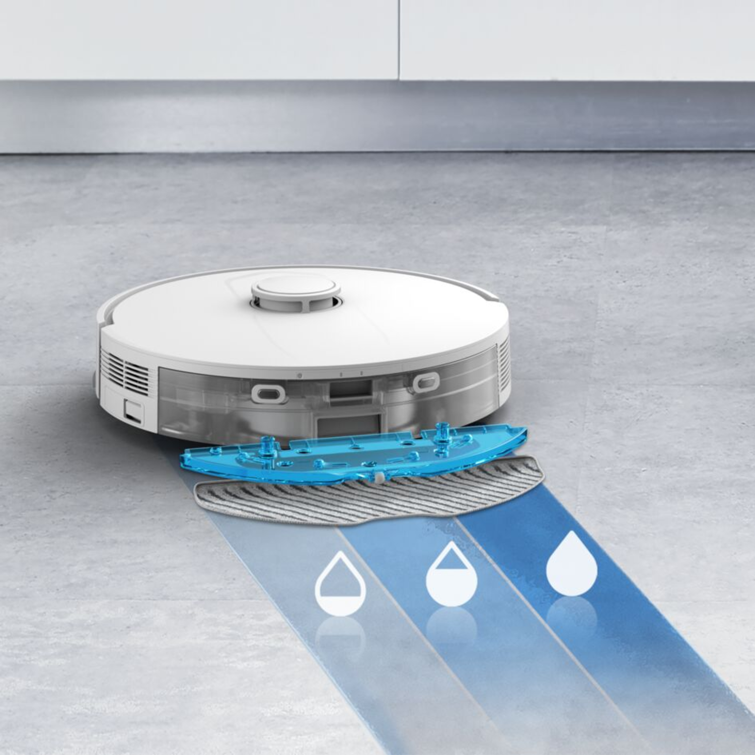 A white robot vacuum cleaner with a blue mop attachment is on a floor.