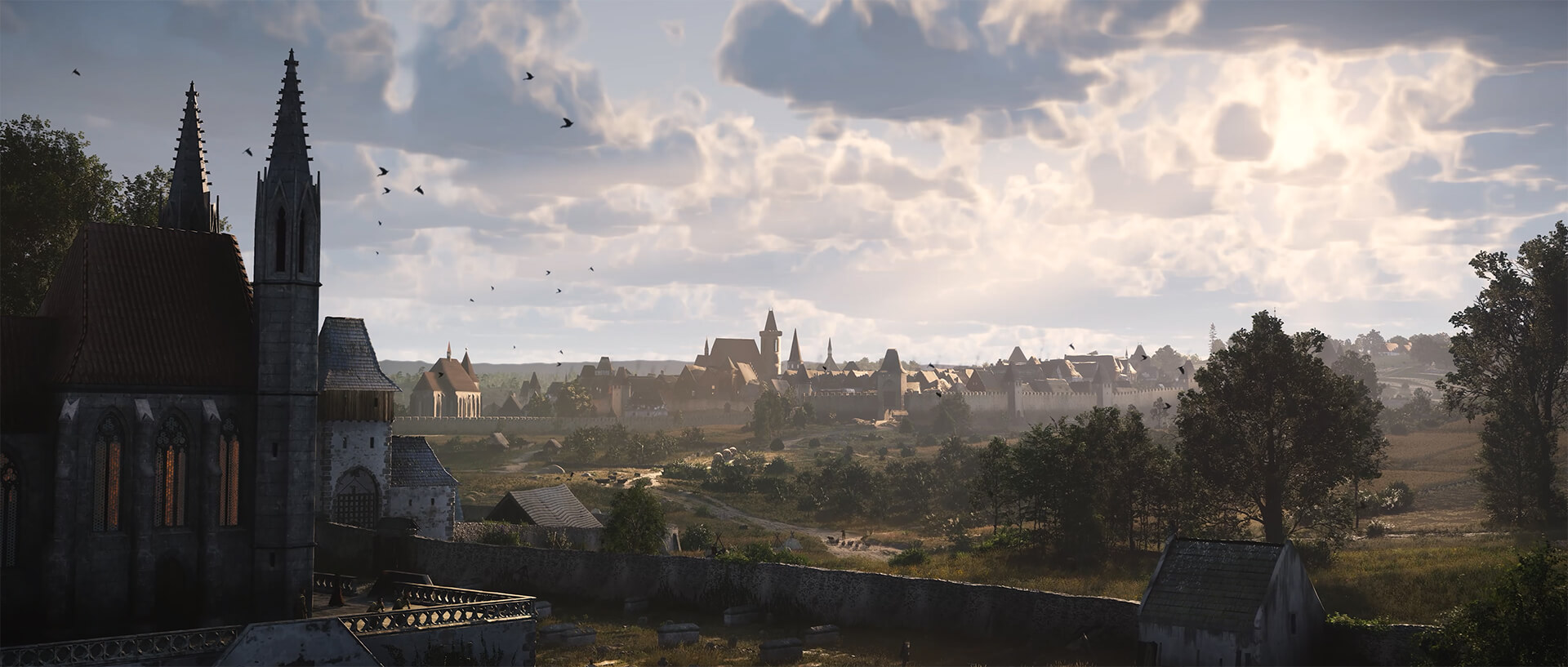 Scena di città medievale con edifici, una chiesa e vista panoramica al tramonto.