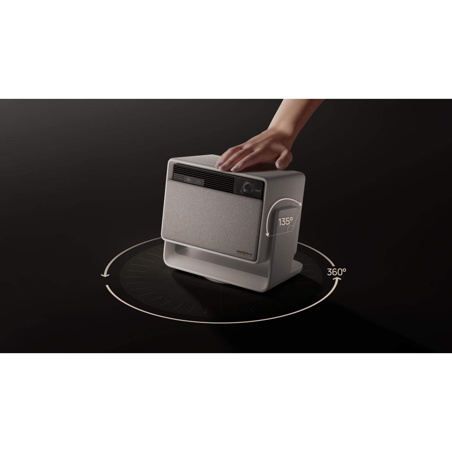 A hand touching a white and gray air purifier, with degree markings.