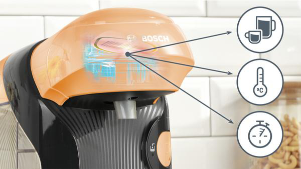 Bosch Kaffeemaschine mit transparentem Bereich, der Innenleben zeigt, mit Tassen-, Temperatur- und Timer-Symbolen.