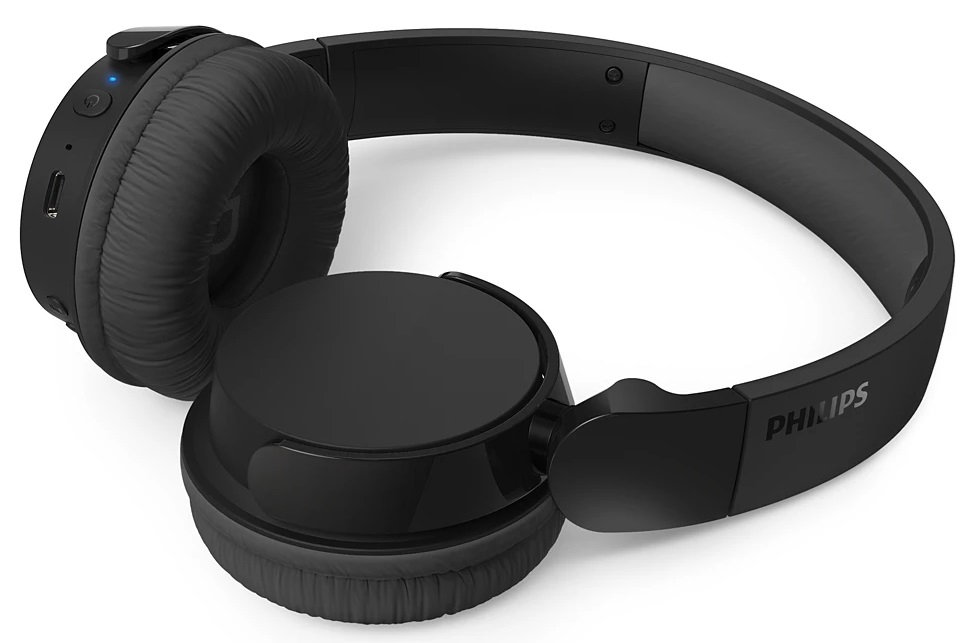Czarne słuchawki Philips na białej powierzchni.