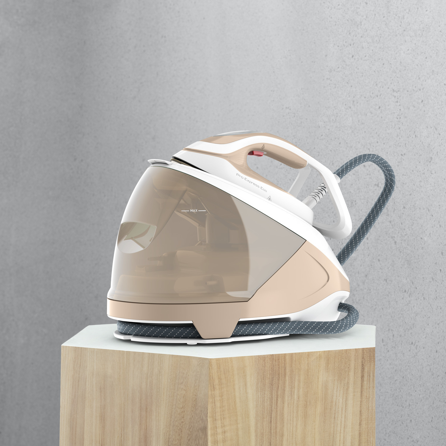 White and beige steam iron on a wooden stand, against a gray wall.