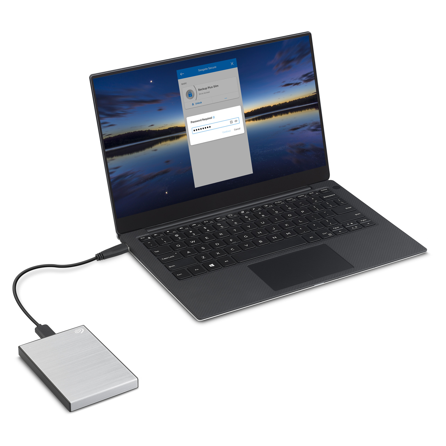 Un ordinateur portable connecté à un disque dur externe, affichant une demande de mot de passe.