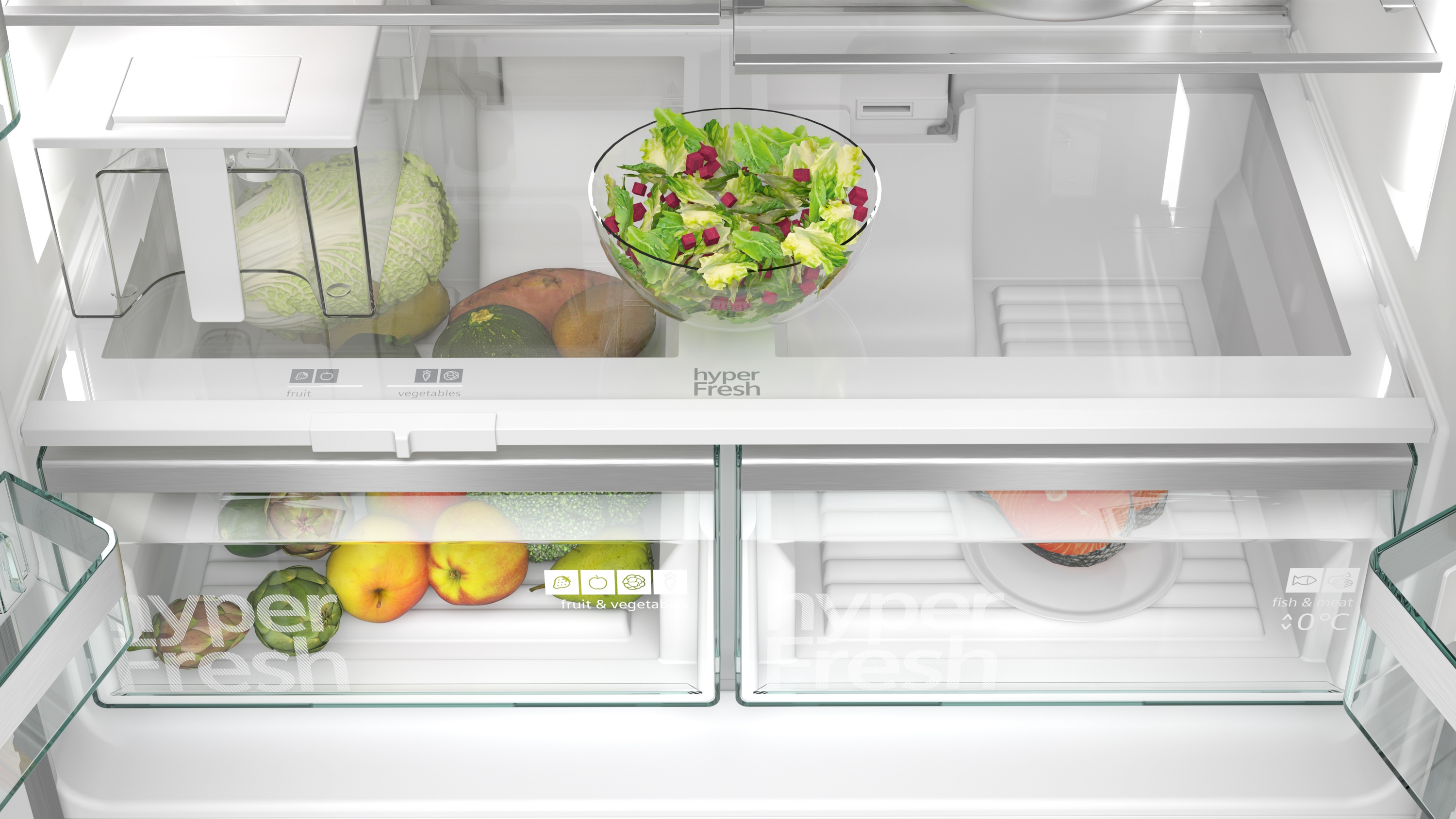 Kühlschrankinnenraum mit frischen Produkten in den HyperFresh-Schubladen und einer Salatschüssel.