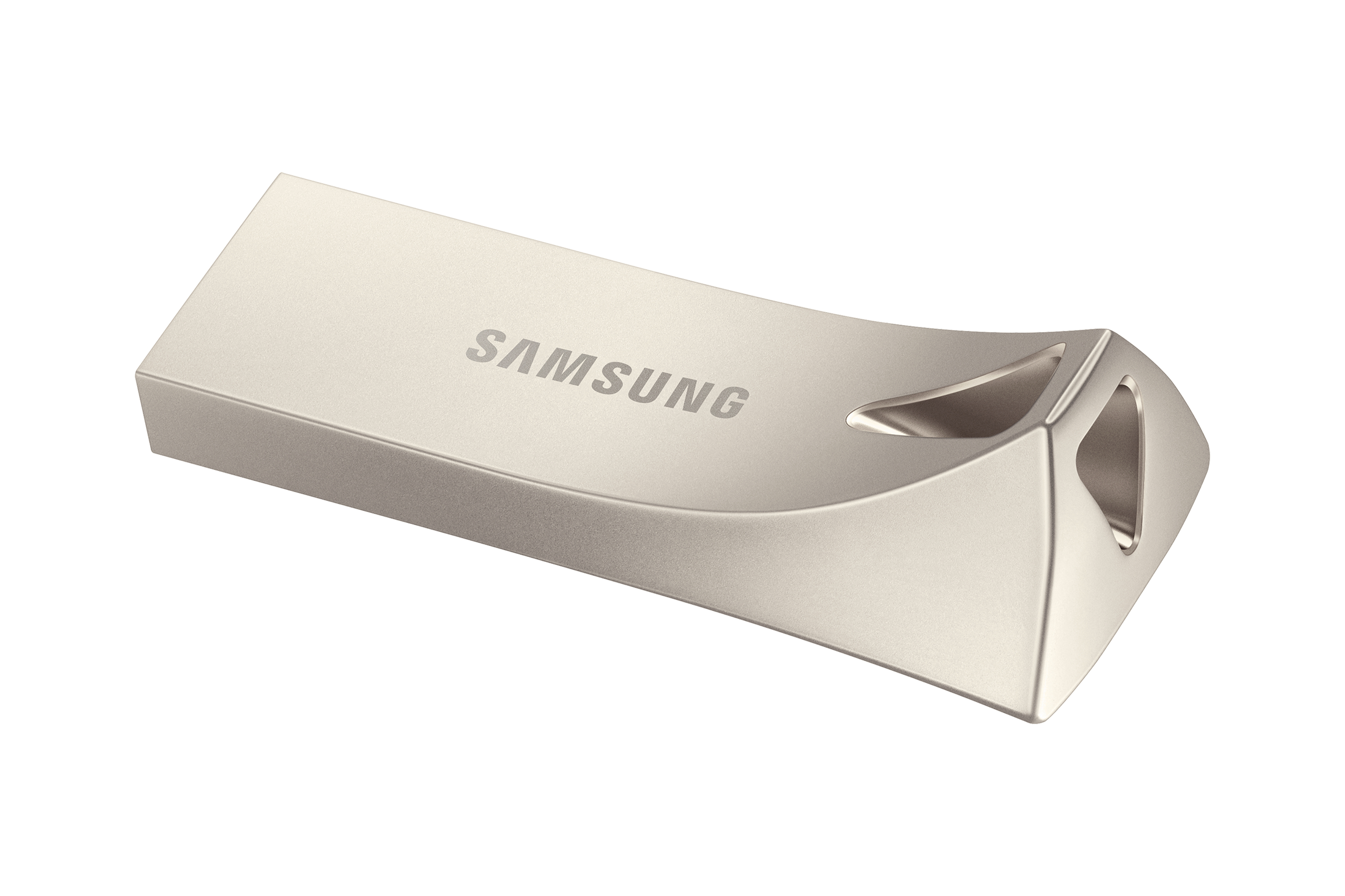 Memoria USB Samsung plateada, diseño curvo, aislada sobre blanco.