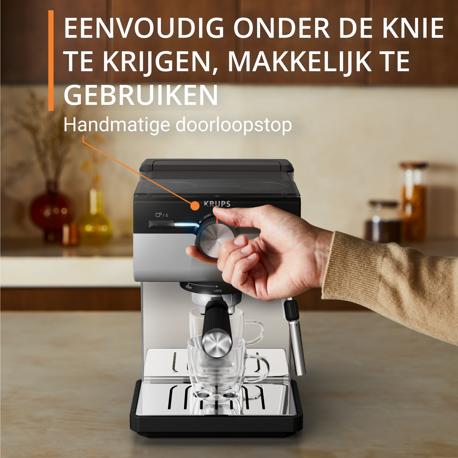 An espresso machine with a hand turning a knob. A glass cup is under the nozzle. Kitchen background.