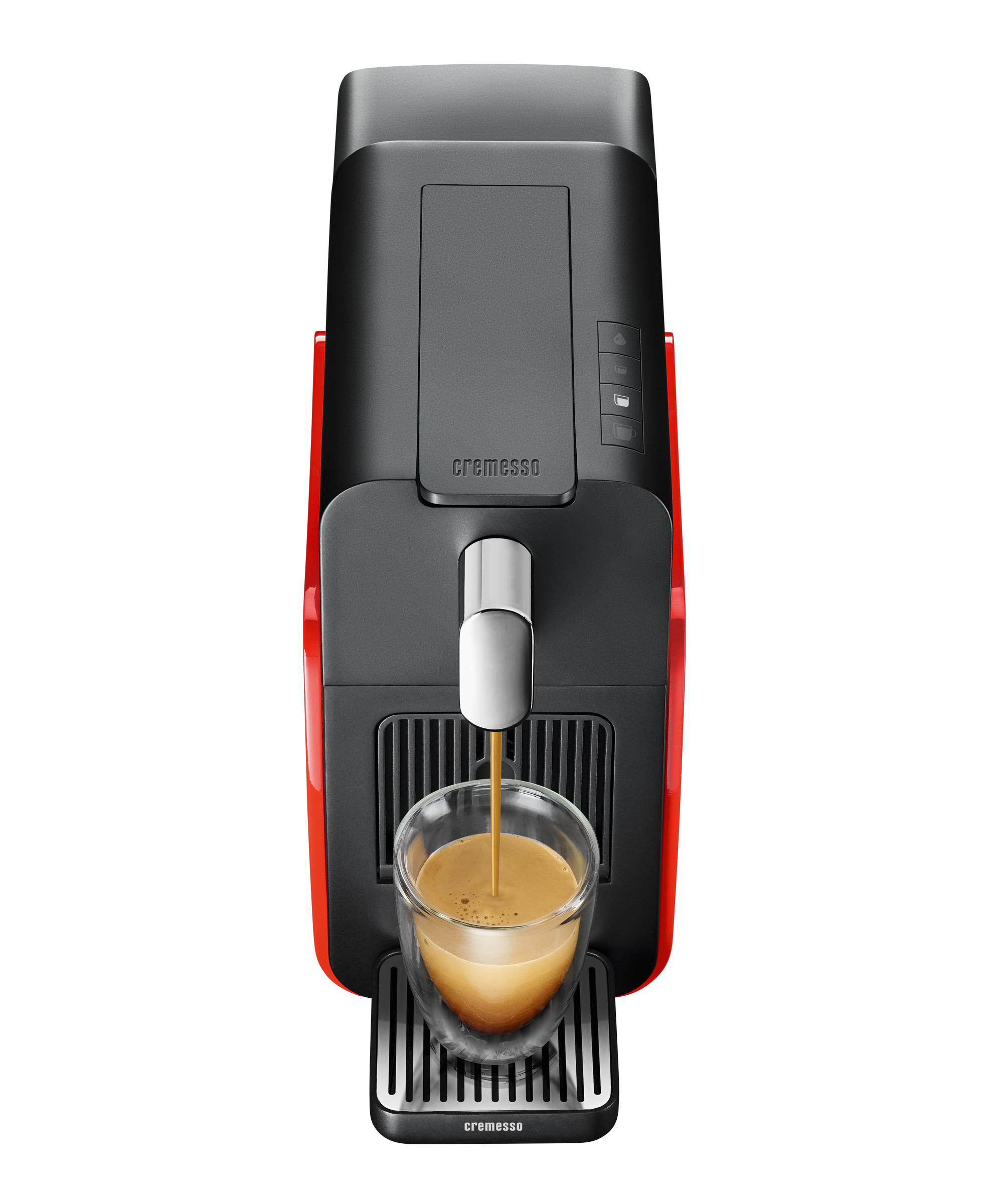 Kaffeemaschine. Schwarz und rot, gibt Kaffee in ein Glas aus. Crema im Glas sichtbar.