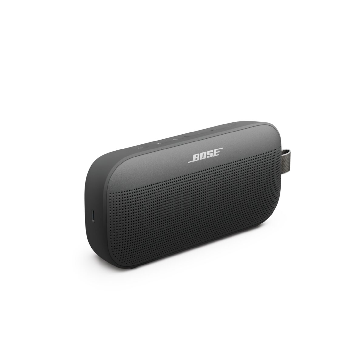 Black Bose speaker. It is rectangular with rounded edges and a gray strap on the side.