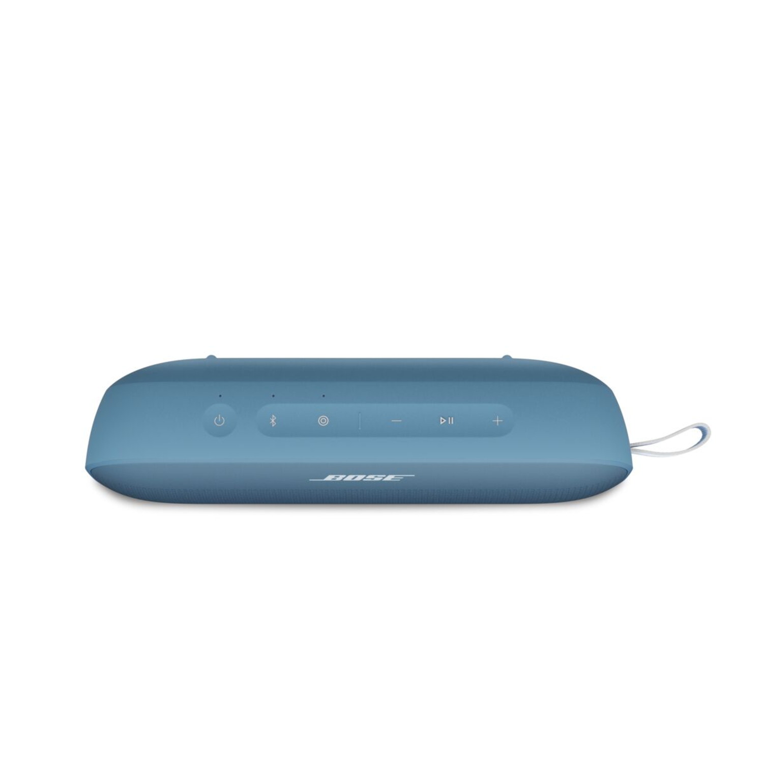 A blue rectangular speaker, with control buttons and a white strap, rests on a white surface.