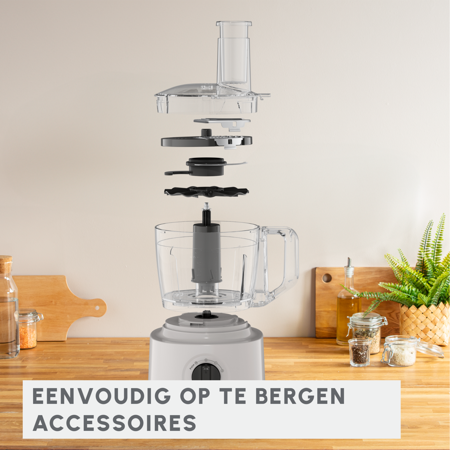 A disassembled food processor with components spread out. The base is white, the accessories are clear.