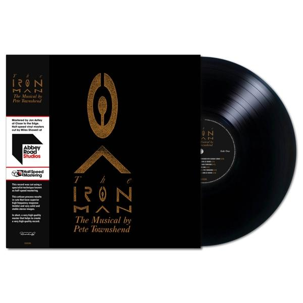 Zwarte vinylplaat met hoes, zwarte en gouden tekst op zwarte achtergrond.