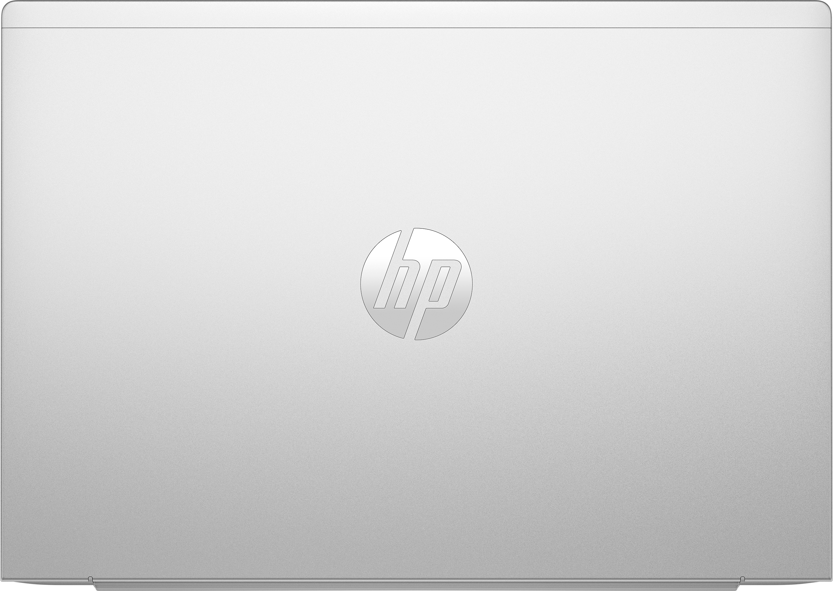 Vista superior de una computadora portátil plateada con un logotipo de HP en el centro.