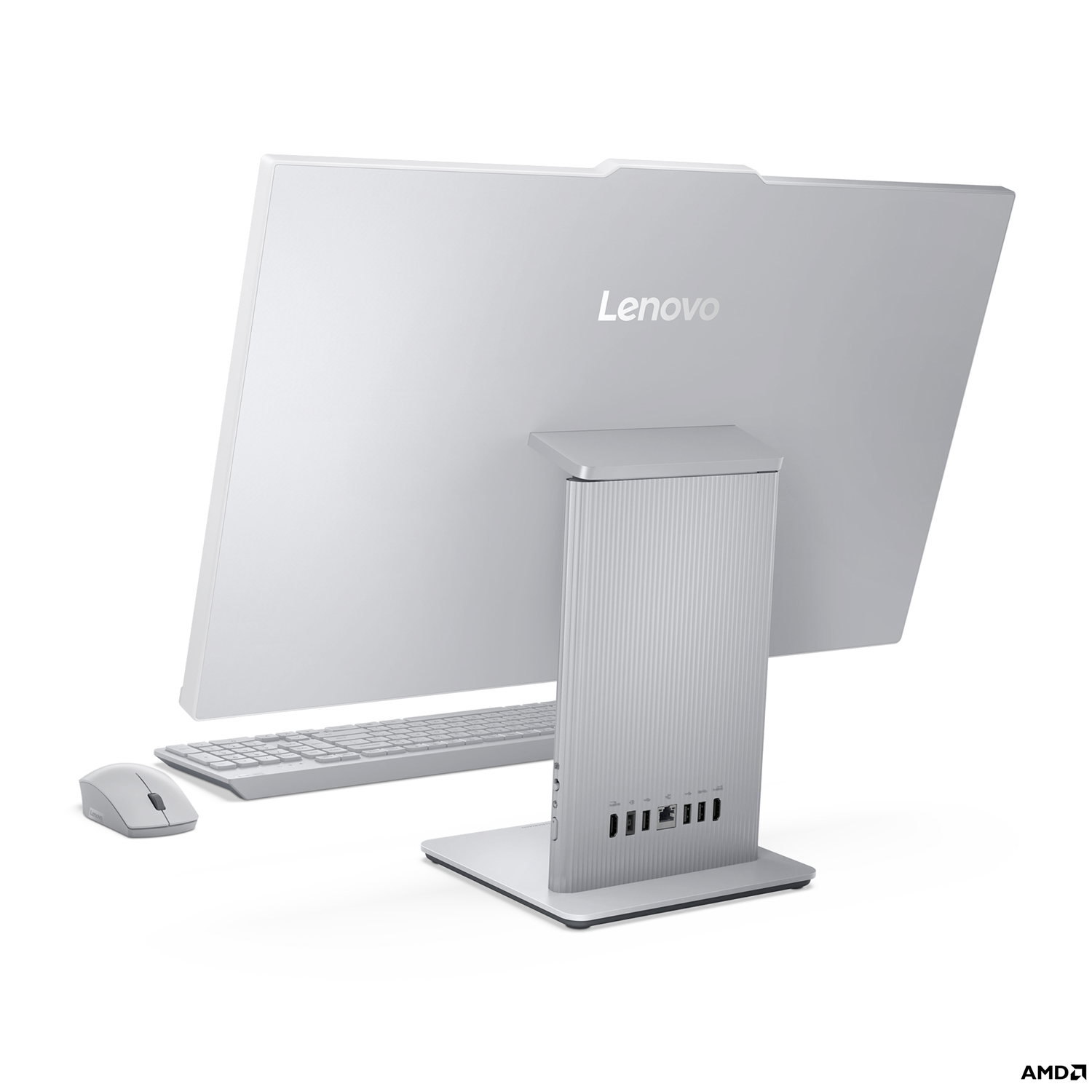 Computer desktop Lenovo bianco visto da dietro. Tastiera, mouse e porte visibili.
