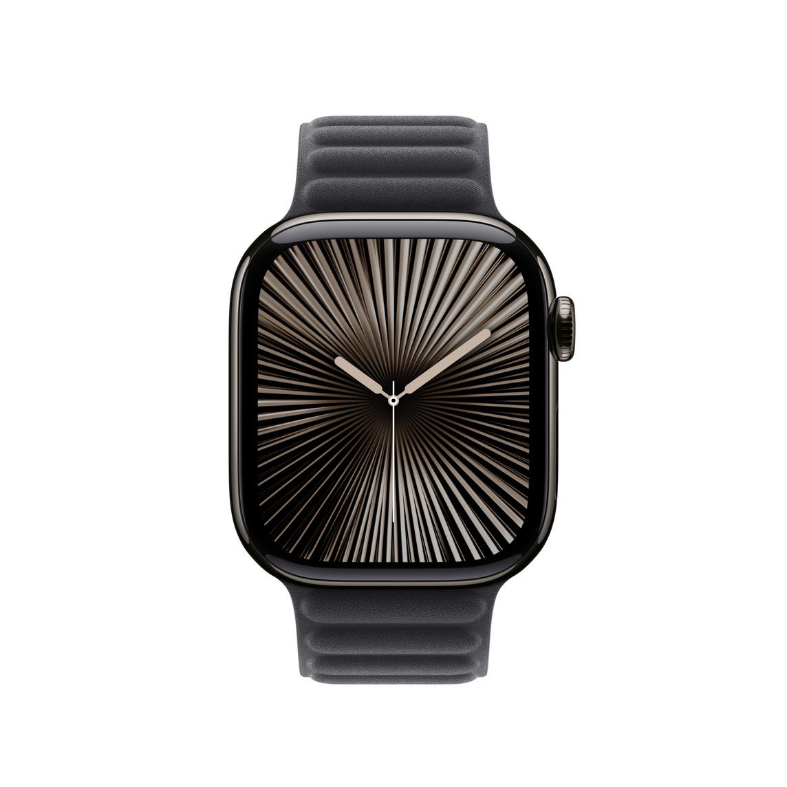 Eine schwarze Apple Watch an einem dunkelgrauen Armband, mit radialem Zifferblatt.