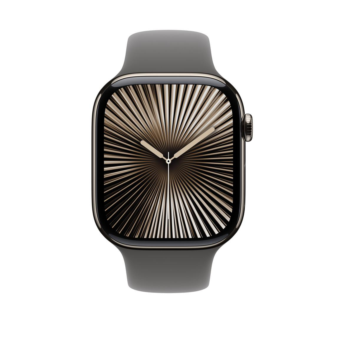 Nahaufnahme einer Smartwatch mit radialem Design auf dem Zifferblatt und grauem Armband.