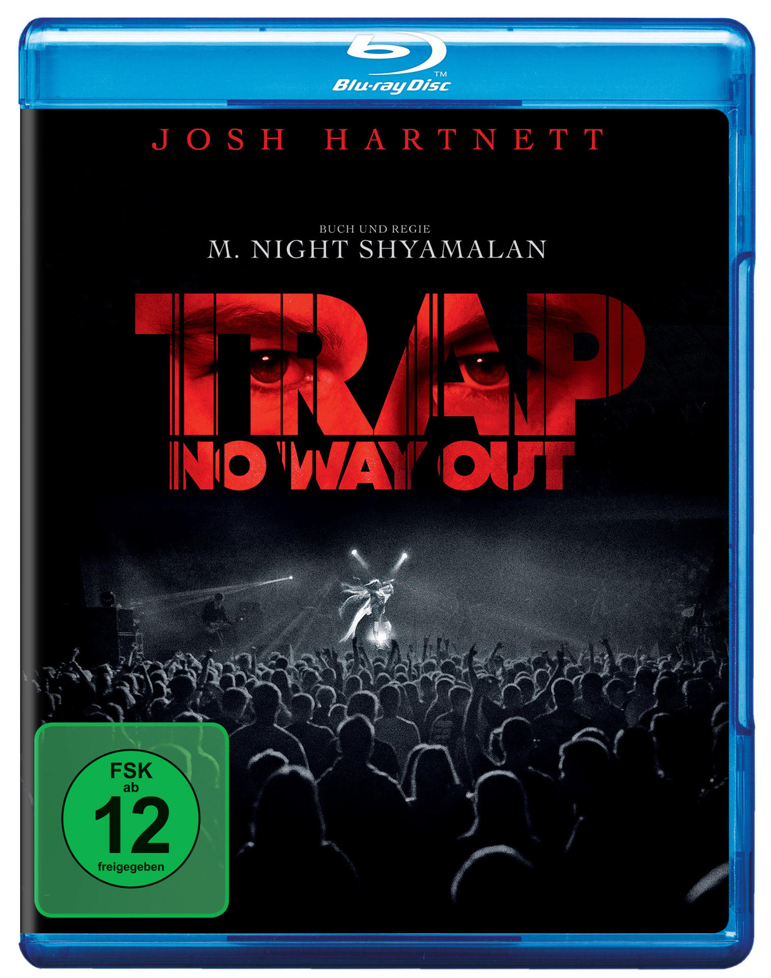 Blu-ray-Cover mit einer Filmszene einer Menge, die einer Aufführung zusieht. Titel auf dem Cover ist 'TRAP'.