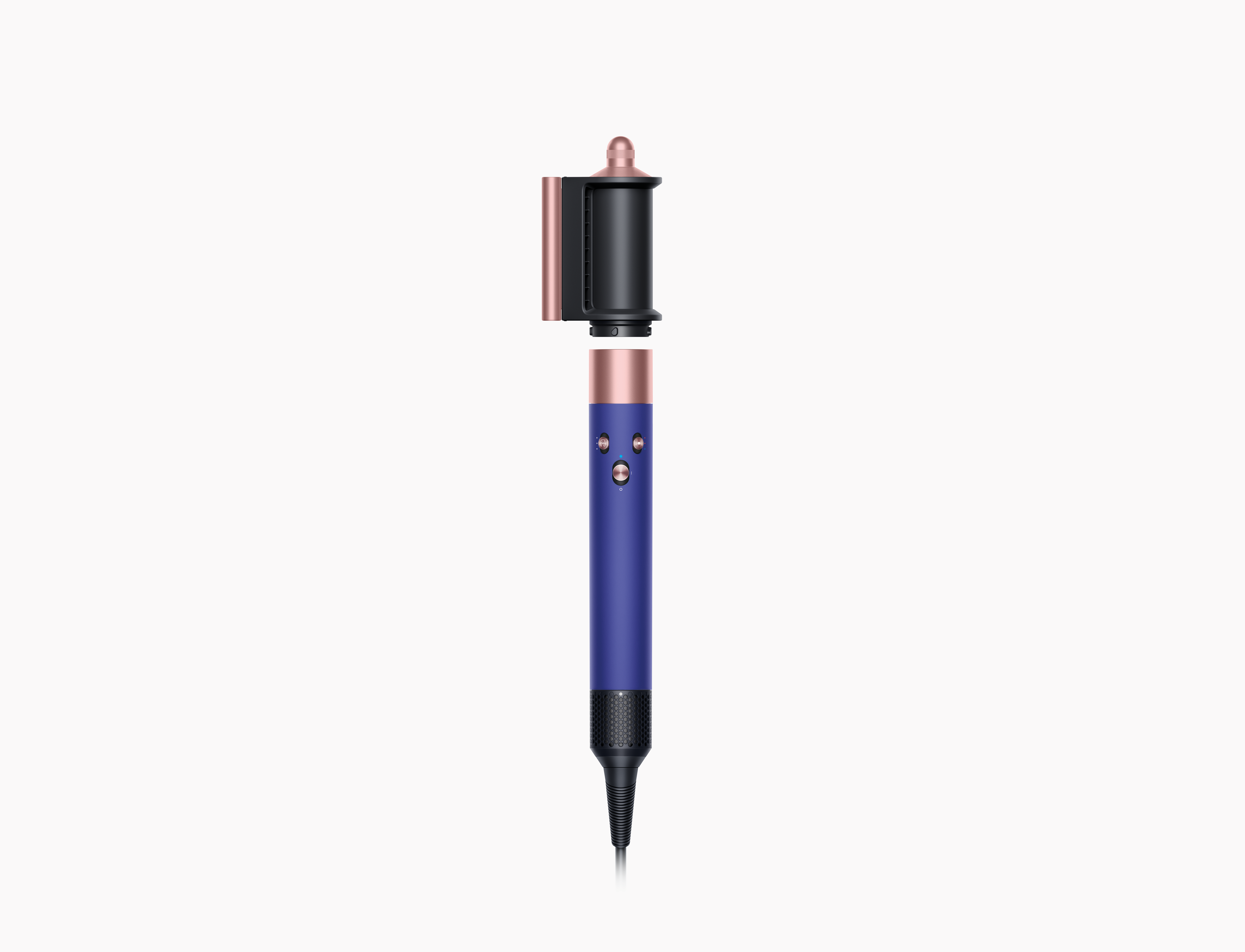 Dyson Haarstyling-Tool in Blau und Roségold, Teile abgetrennt, auf weißem Hintergrund.