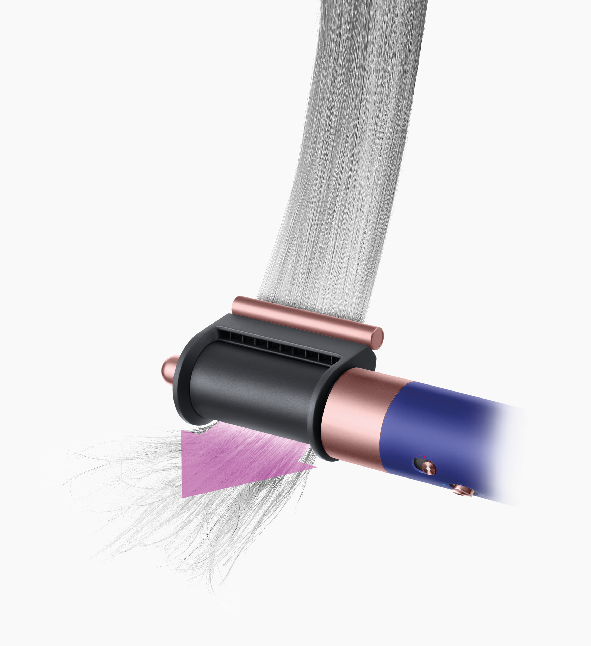 Dyson Haarstyler mit einem Teil des Haares, das gestylt wird, mit einem rosa Pfeil.