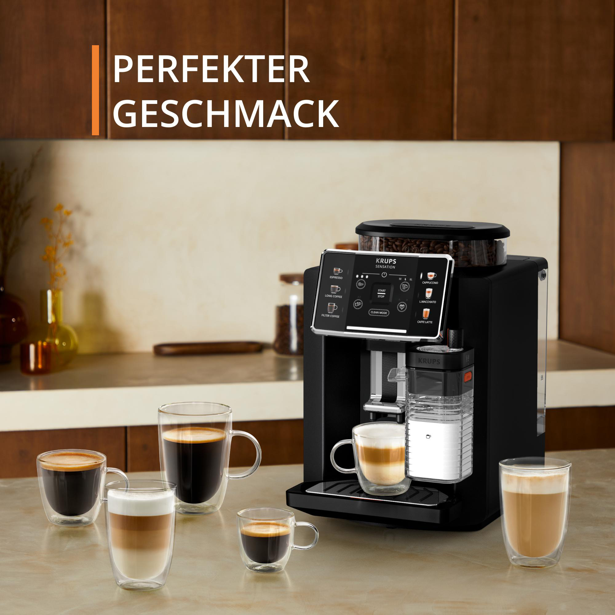 Schwarze Kaffeemaschine mit Kaffeetassen auf der Theke.