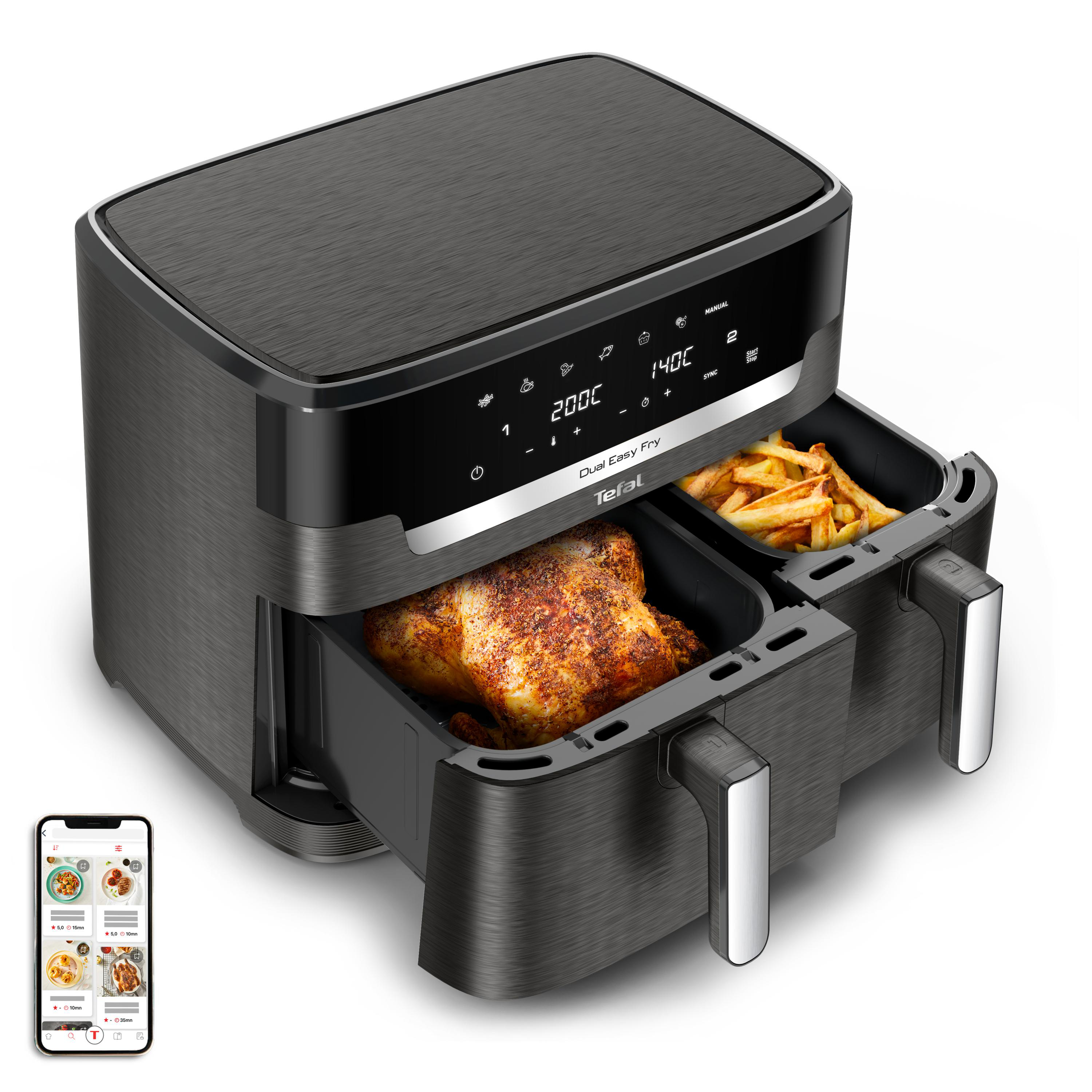 Eine schwarze Dual-Zone-Heißluftfritteuse mit Brathähnchen und Pommes sowie ein Telefon mit Rezepten.