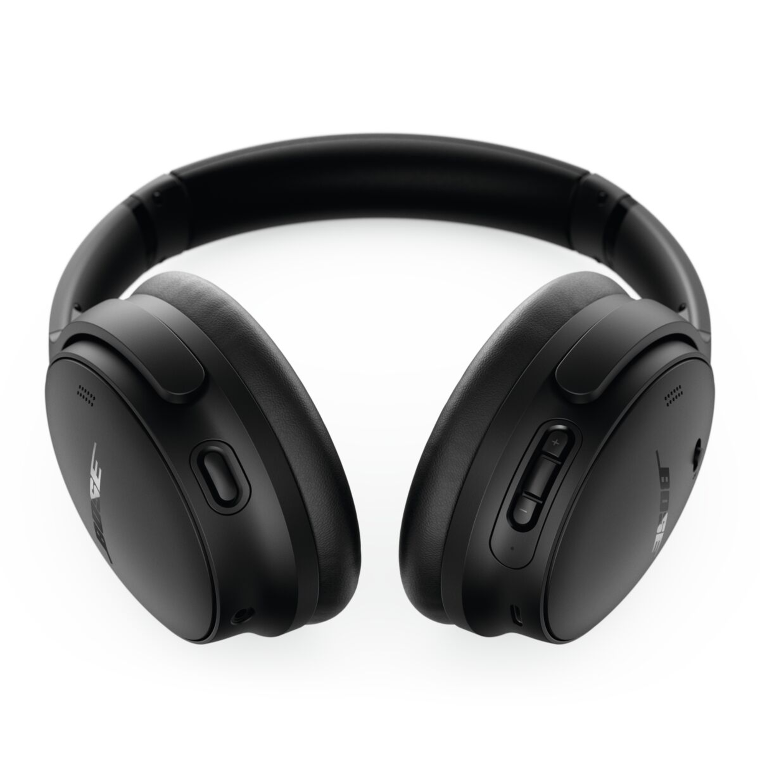 Black Bose headphones. They have earcups and a headband, with control buttons on the right earcup.