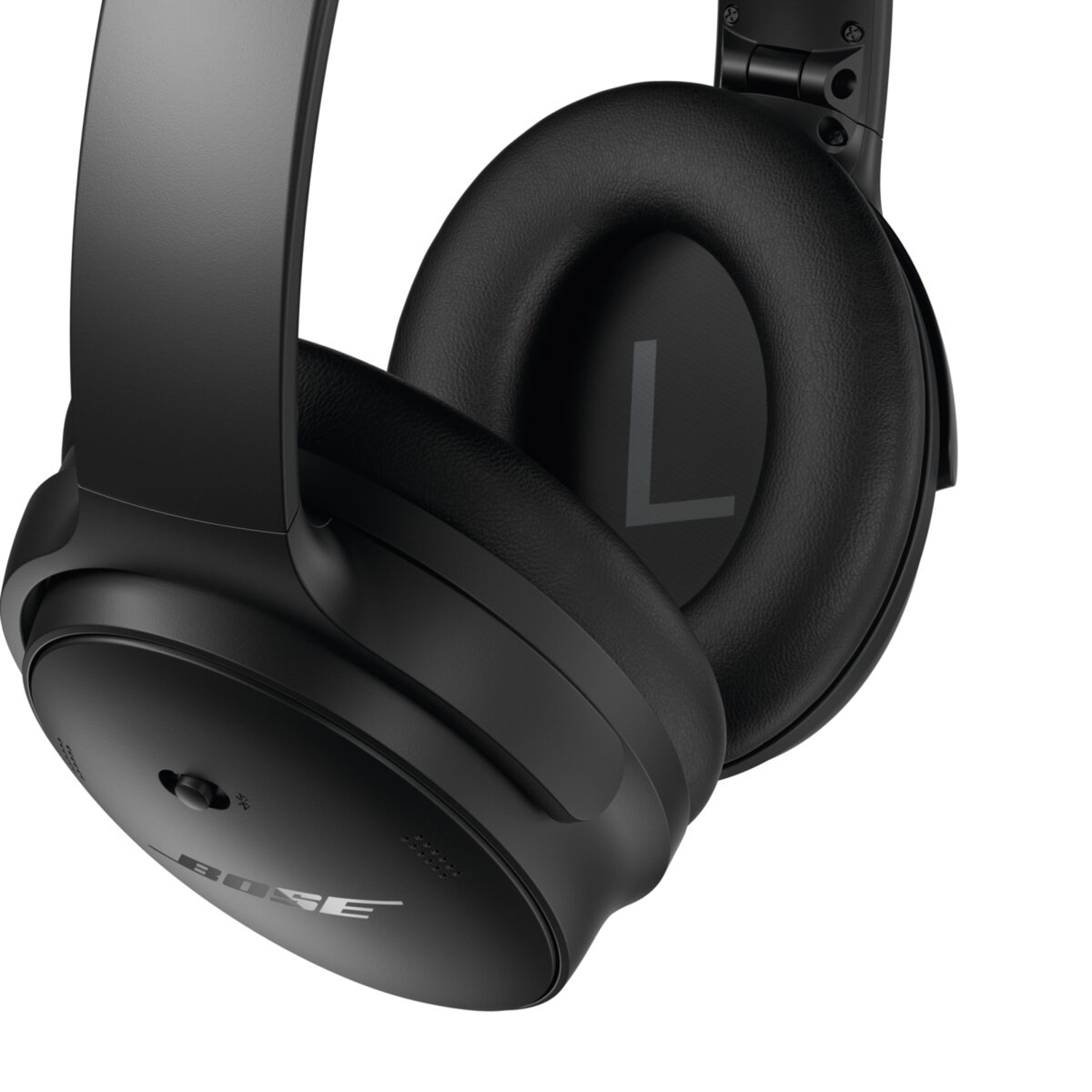 Black Bose headphones with the letter 'L' visible on the earcup, white background.