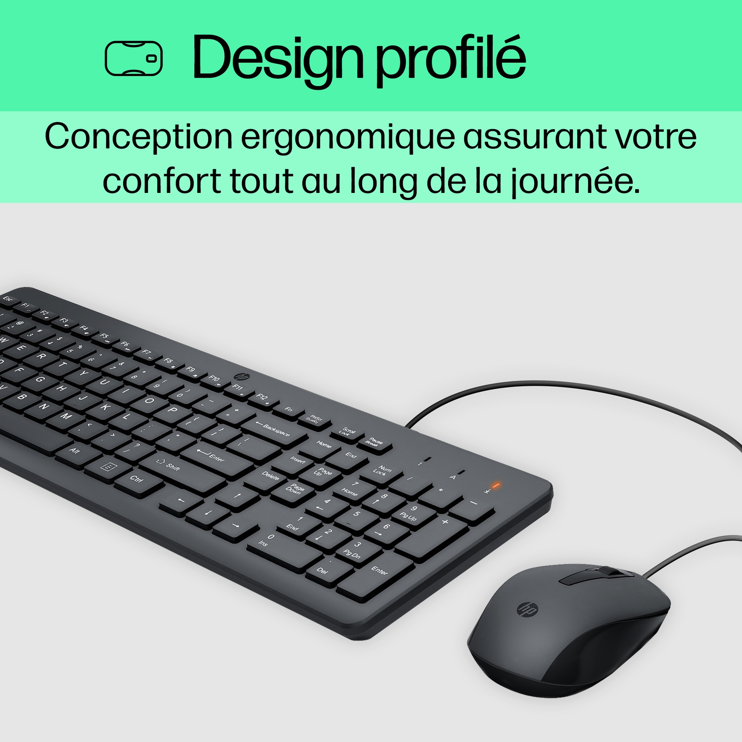 Ensemble clavier et souris noirs. Texte sur le design ergonomique. Fond blanc.