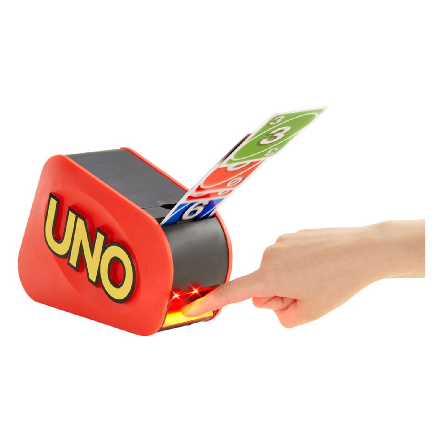 A person's hand pressing a button on a red UNO card dispenser.