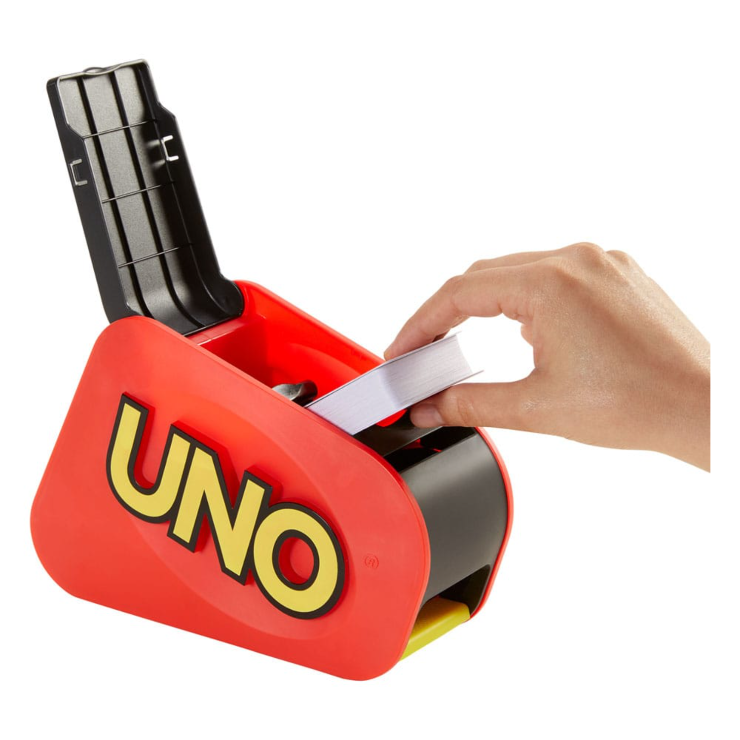 A hand pulls cards from a red and black UNO card dispenser.