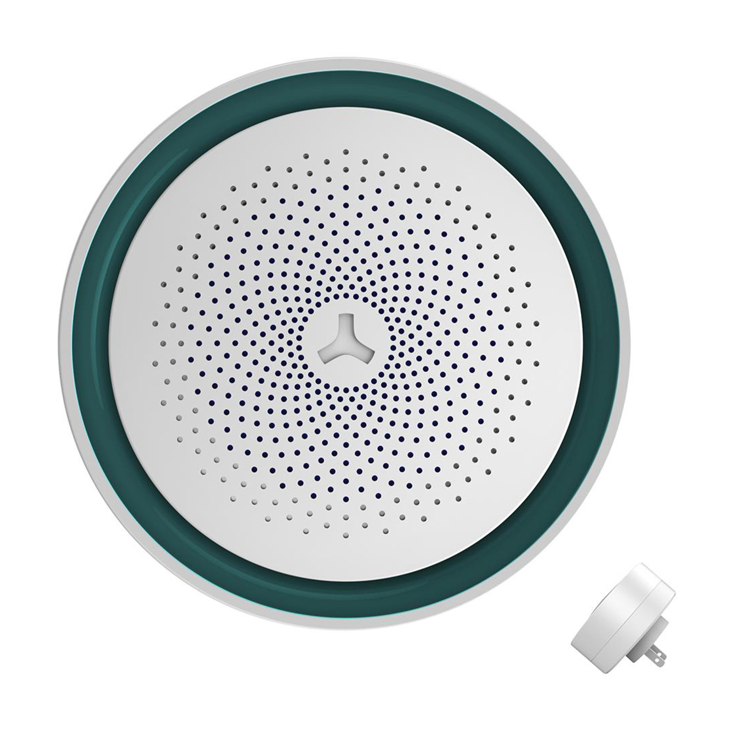 Dispositivo circolare bianco con bordo verde e spina bianca. Molti piccoli punti blu.