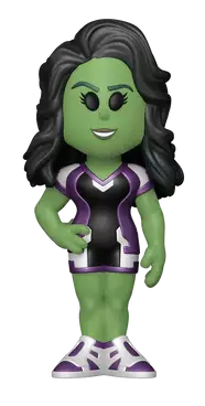 Egy zöld She-Hulk figura. Ruhát visel. Áll és mosolyog.