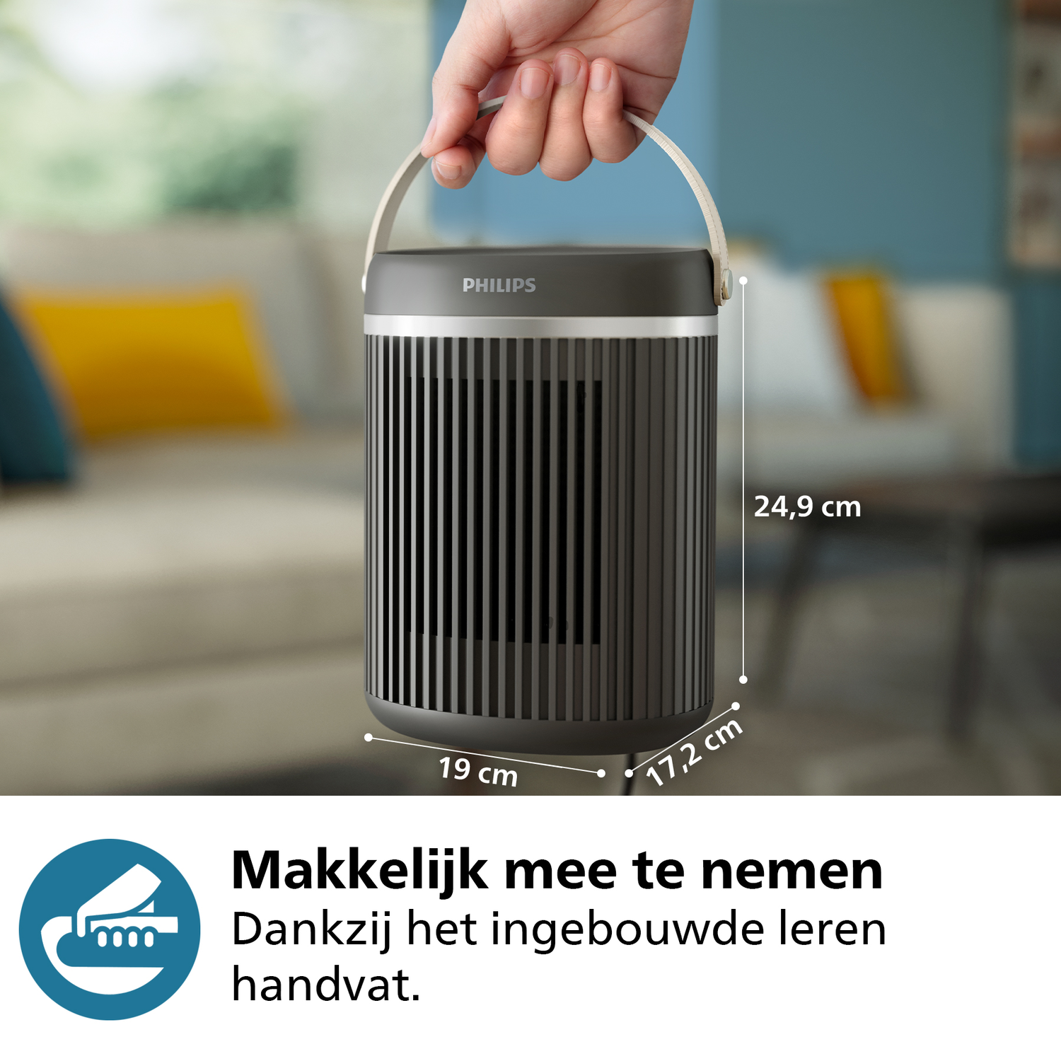 A portable heater with a handle. It is black with a silver top and a white handle. Dimensions are shown.