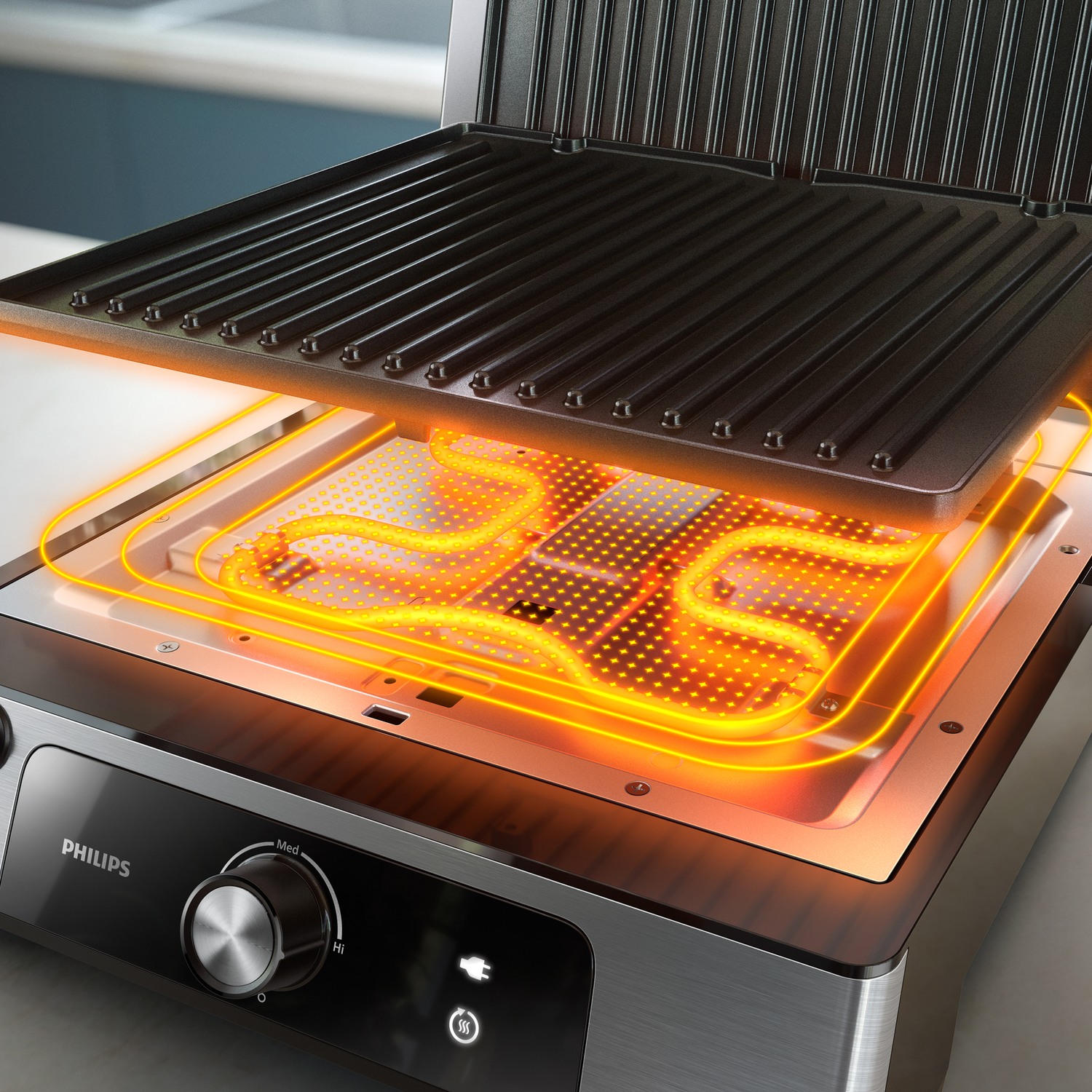 A silver and black grill with the top open. The heating element is visible and glowing.